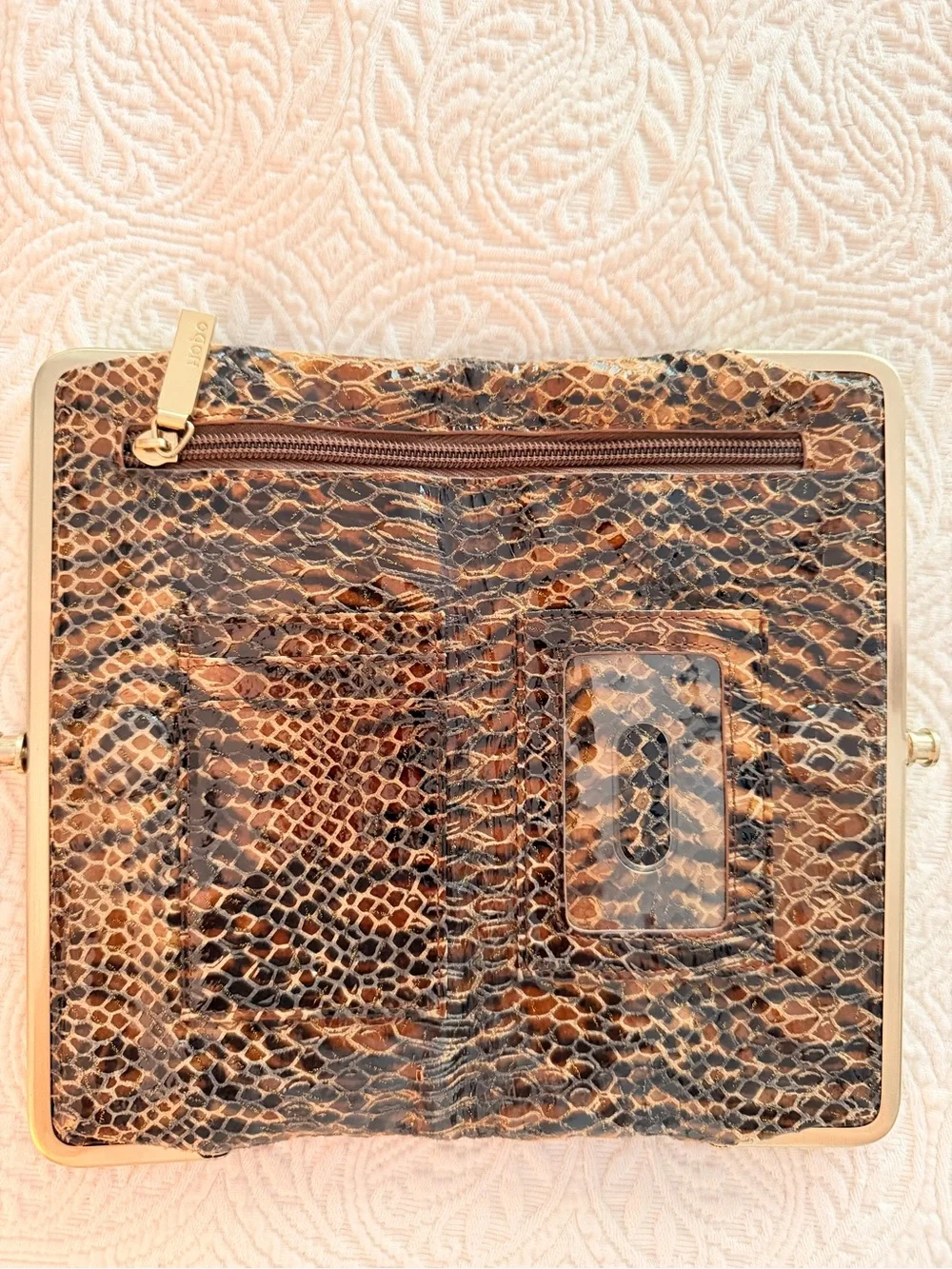 HOBO Animal-Print Snake-Embossed Frame Clutch in Black and Brown
